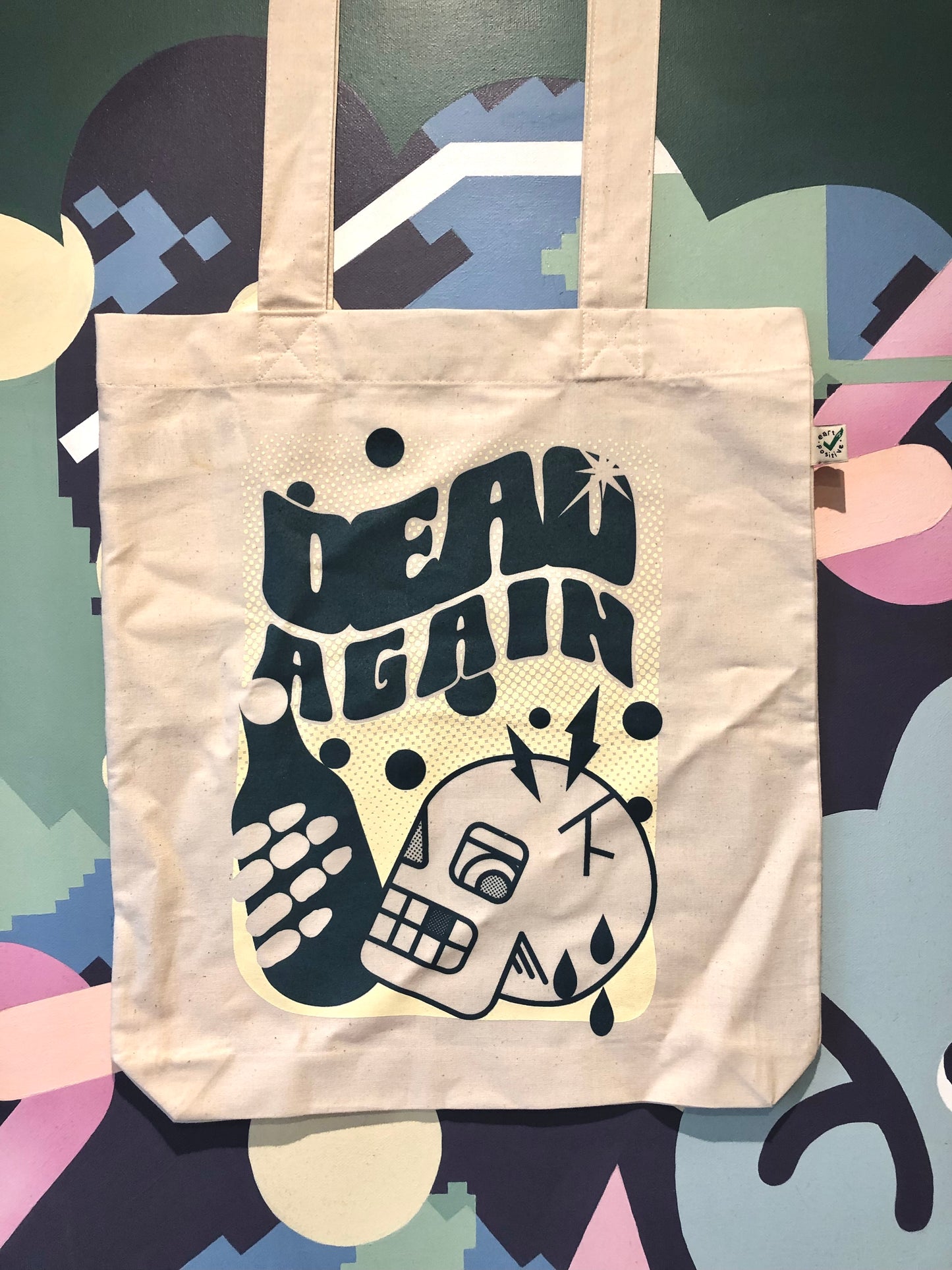 ‘Dead again’ Tote bag